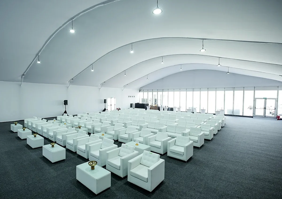 Arch tents UAE - Interior of Arch Tents with VIP sofas, carpets and lighting - Arch Tent - Alfares International Tents
