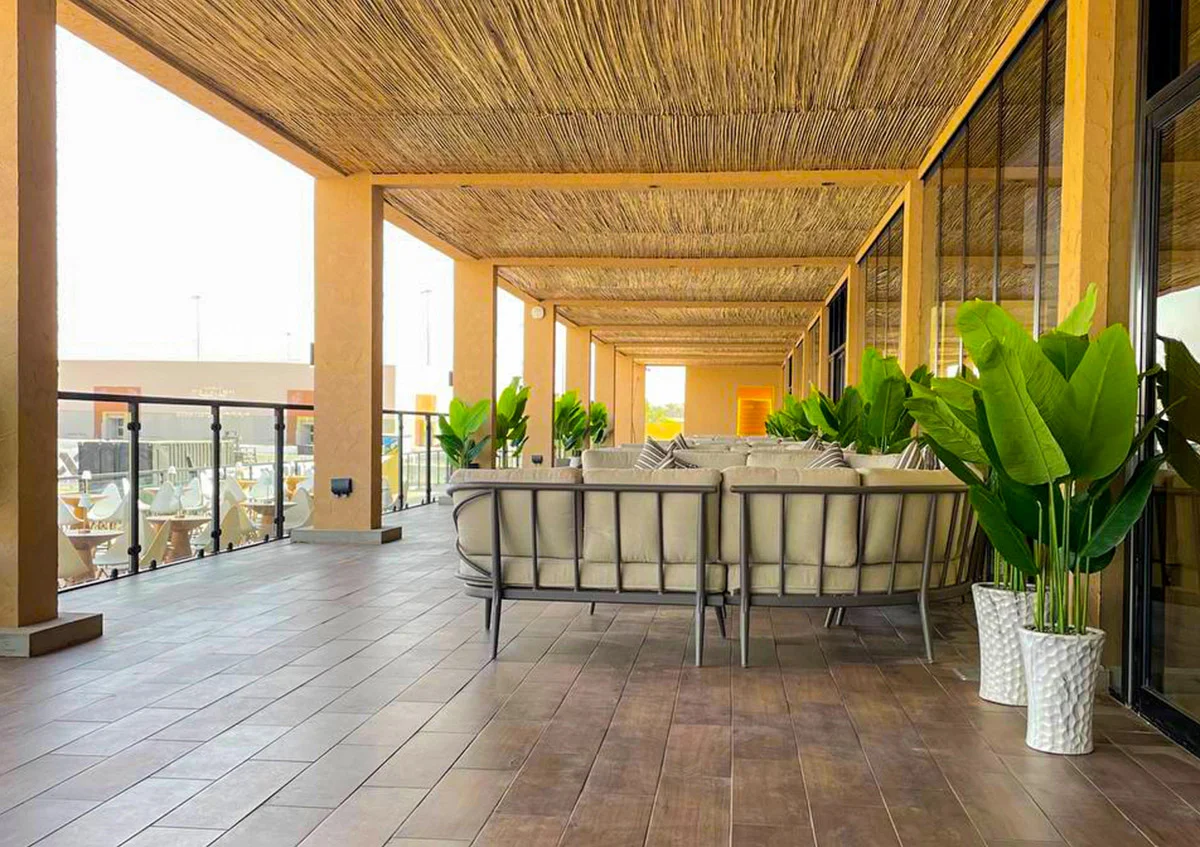 Flat Double Decker tents UAE - Interior view of Flat Double Decker tent with wooden texture and quality interiors - Flat Double Decker Tent - Alfares International Tents