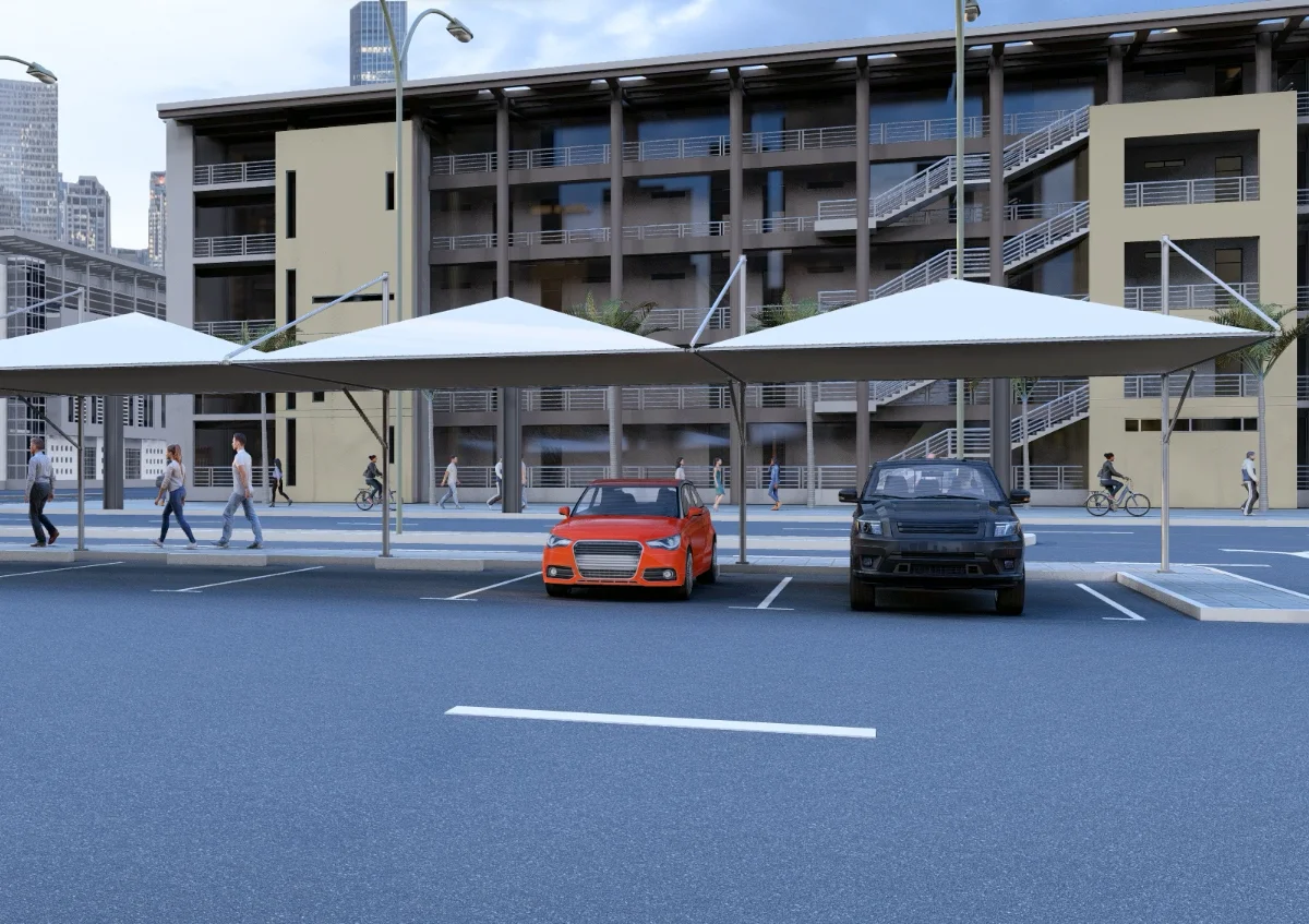 pyramid car parking shade UAE - cars parked under pyramid car parking shade surrounded by commercial buildings - Pyramid Parking Shade - Alfares International Tents