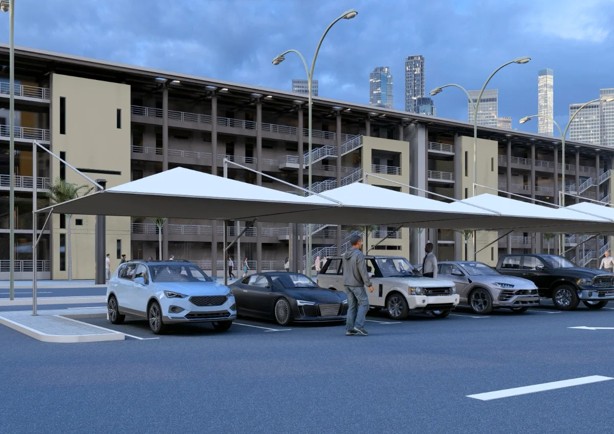pyramid car parking shade UAE - cars parked under pyramid car parking shade surrounded by commercial buildings - Pyramid Parking Shade - Alfares International Tents