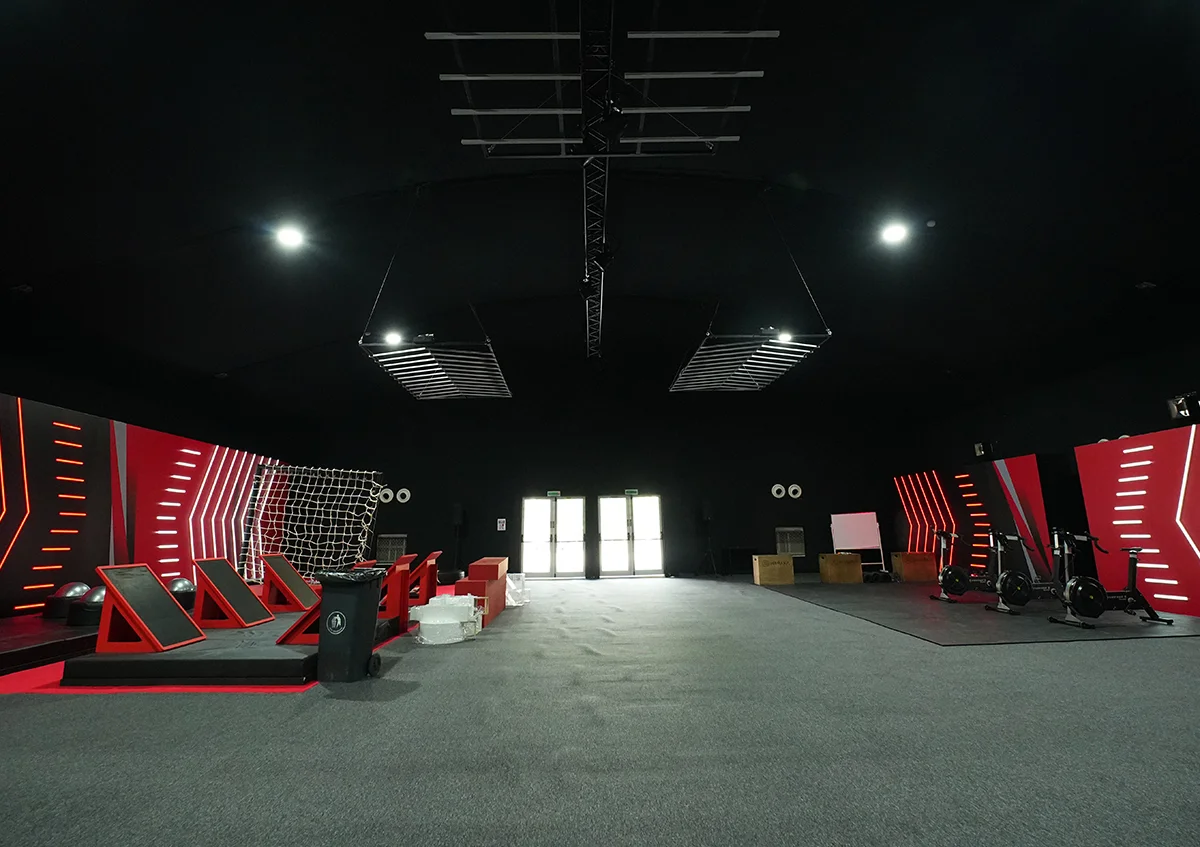 sports tents UAE - Arch tent interior with sports equipment - Sports Tent Alfares International Tents